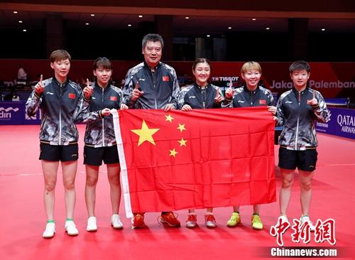 當地時間8月28日A中國乒乓球隊戰勝朝鮮隊A獲得第18屆亞運會乒乓球女子團體冠軍C