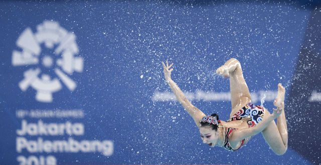 2018年8月29日A中國隊選手在女子集體自由自選比賽中C當日A在第18屆亞運會花樣游泳集體項目中A中國隊以186.9395分的成績獲得冠軍C 新華社記者費茂華攝