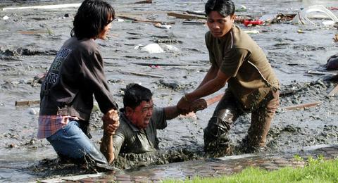 印度尼西亞山洪暴發A至少造成42人死亡C]美聯社^