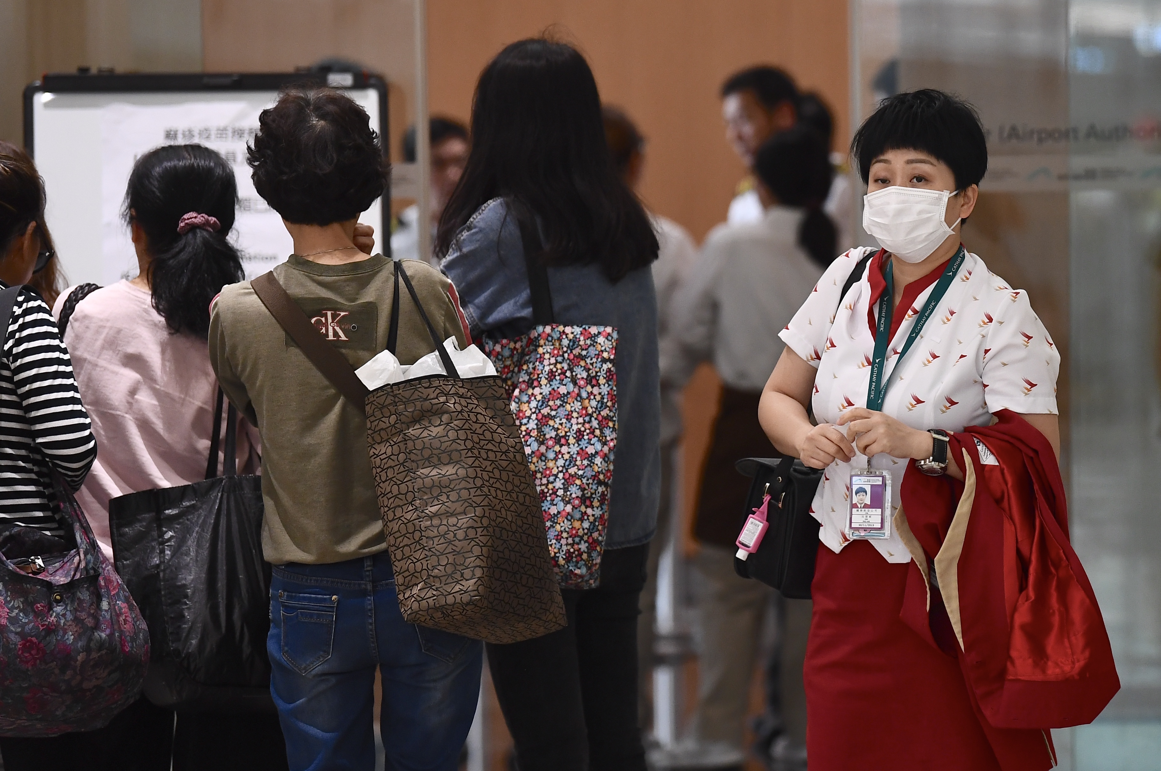 陳肇始表示A下月引入58000劑疫苗A望留給免疫力不足的人C圖為香港國際機場為機場職員及機員接種麻疹疫苗站點C(中新社資料圖片)