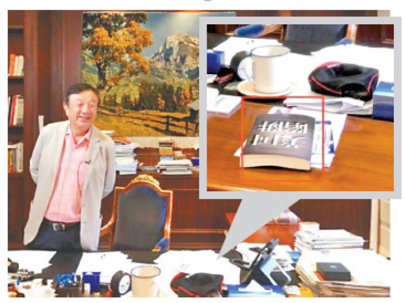 彭博社記者27日披露的照片顯示A華為創始人任正非書桌上放有一本m美國陷阱n 網絡圖片