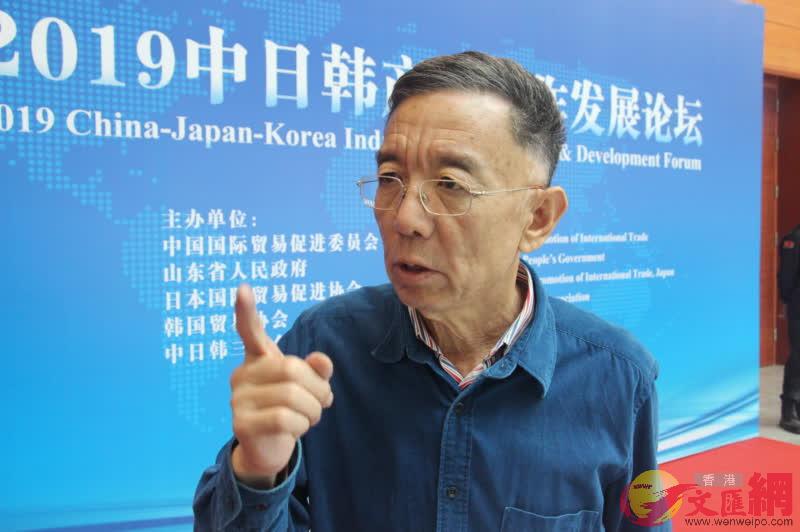 美麗中國副主席馬金法稱香港應該積極融入到內地發展大潮中來 ]記者 胡臥龍 攝^