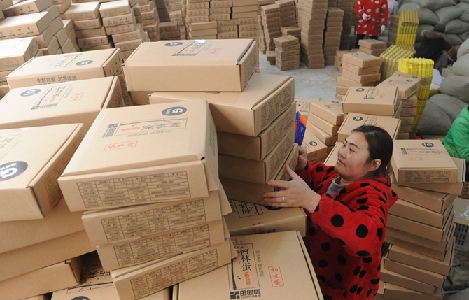 美國指責中國以較低郵費向美國傾銷貨物]新華社資料圖^
