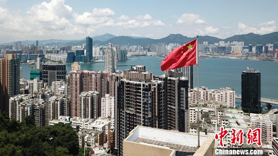 1949年10月1日A伴隨著新中國的誕生A培僑中學成為香港第一批升起五星紅旗的學校之一C中新社