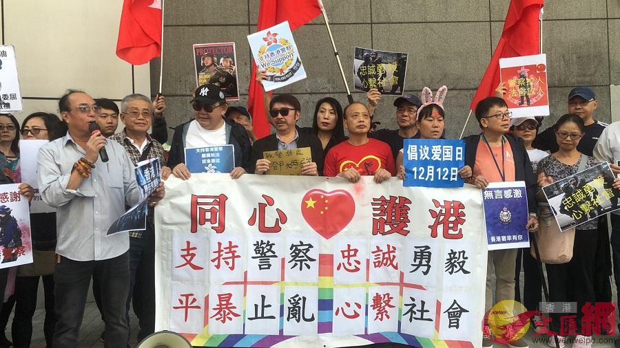 民間團體u同心護港v全力支持香港新任警務處處長鄧炳強帶領警隊止暴制亂A令社會回復安寧C