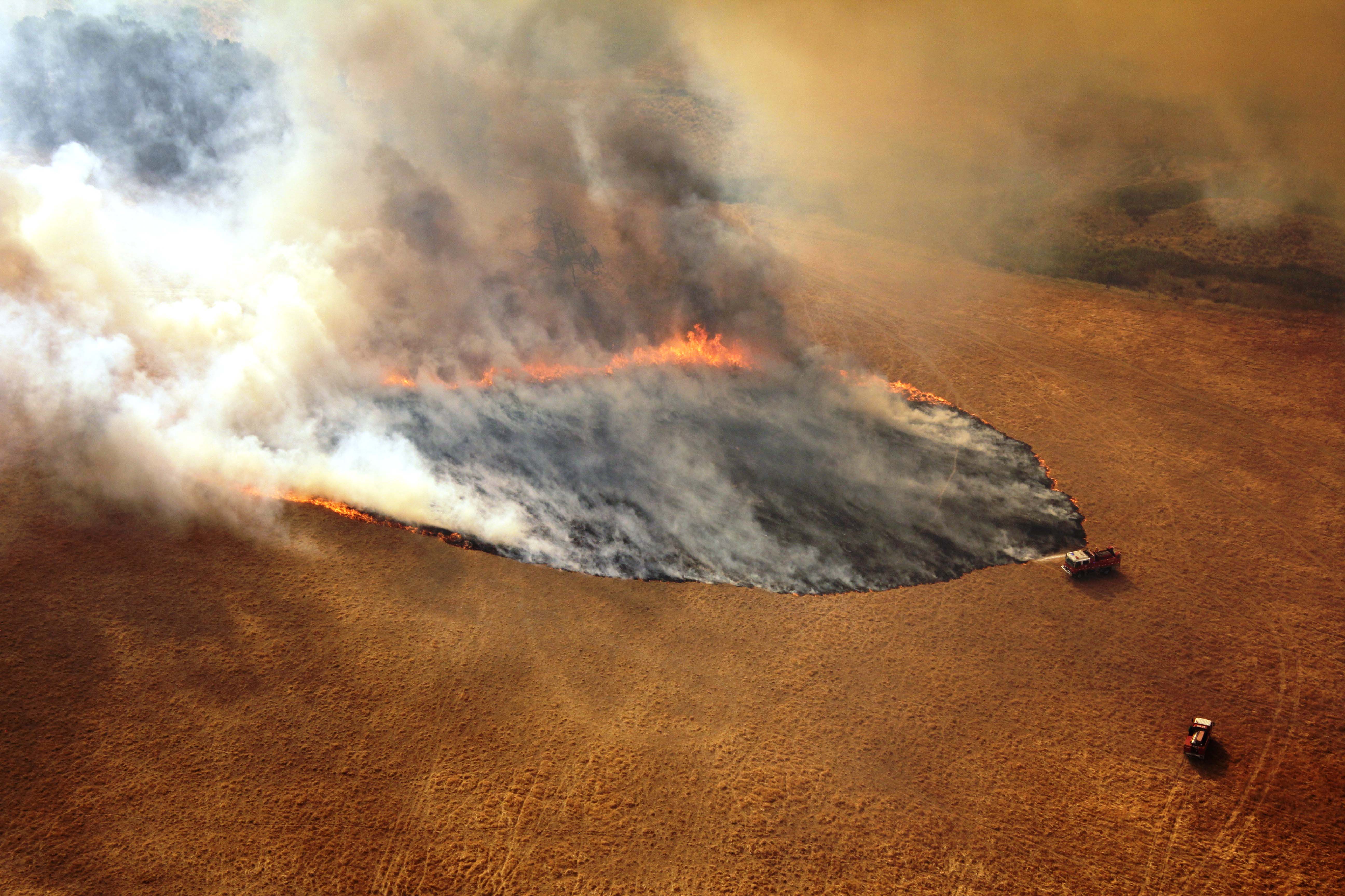 澳大利亞林火至今已經燃燒了超過1120萬公頃的土地面積 ]新華社^
