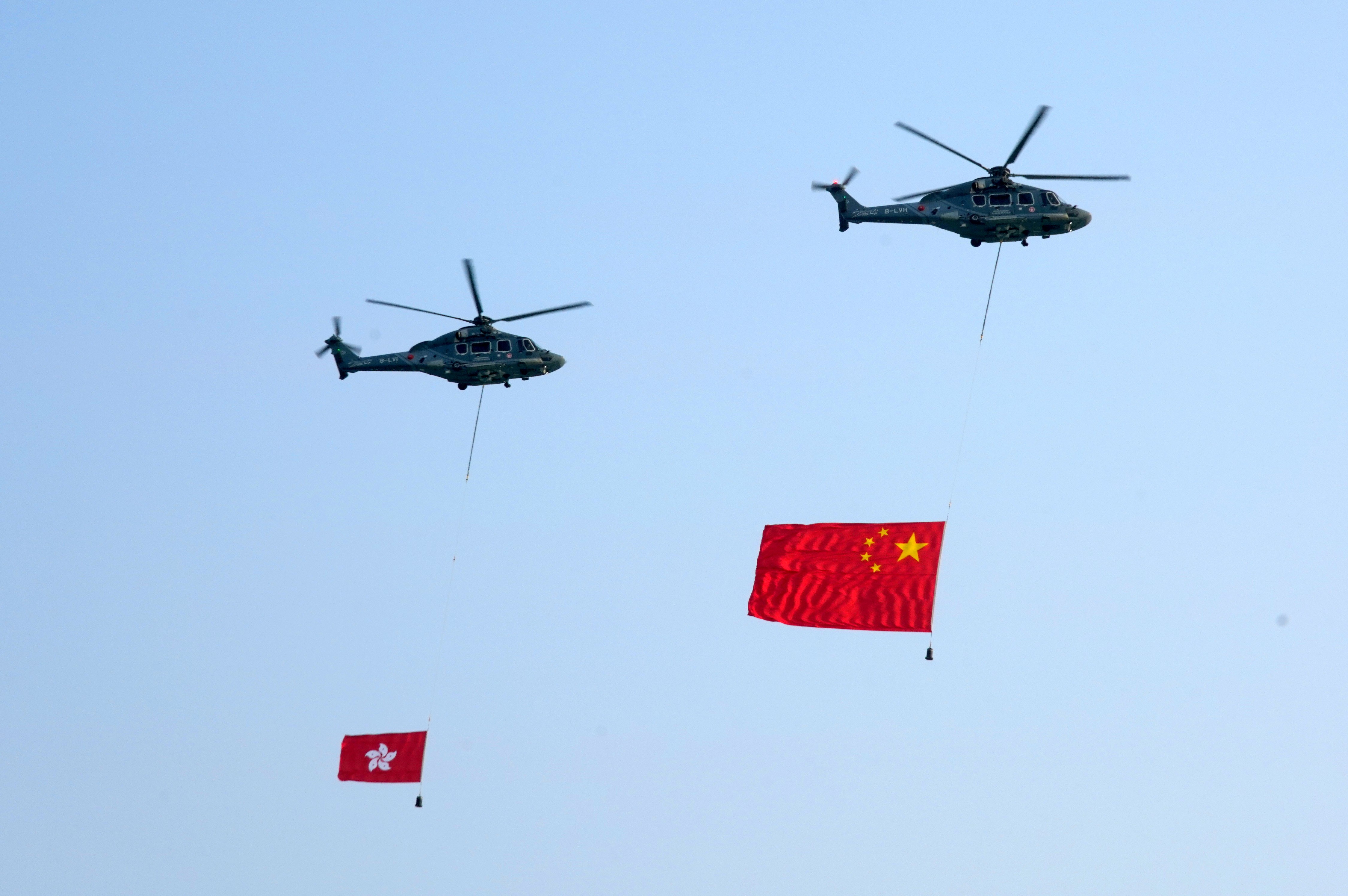 10月1日上午A為慶祝中華人民共和國成立70周年A香港特別行政區政府在金紫荊廣場舉行昇旗儀式C