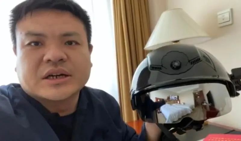 劉若鵬介紹光啟智能頭盔在疫情防控中的積極作用]受訪者供圖^