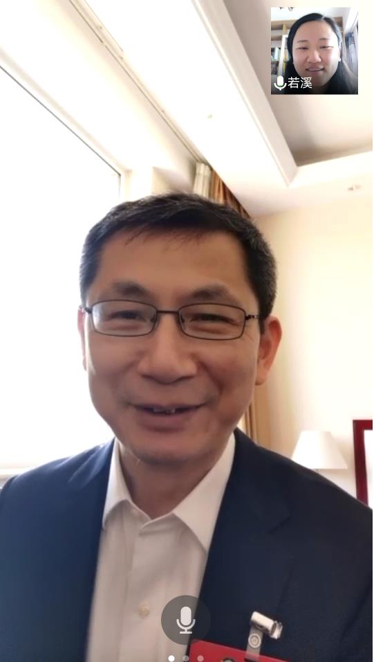 全國政協委員B上海市工商聯副主席王煜接受記者視頻採訪C