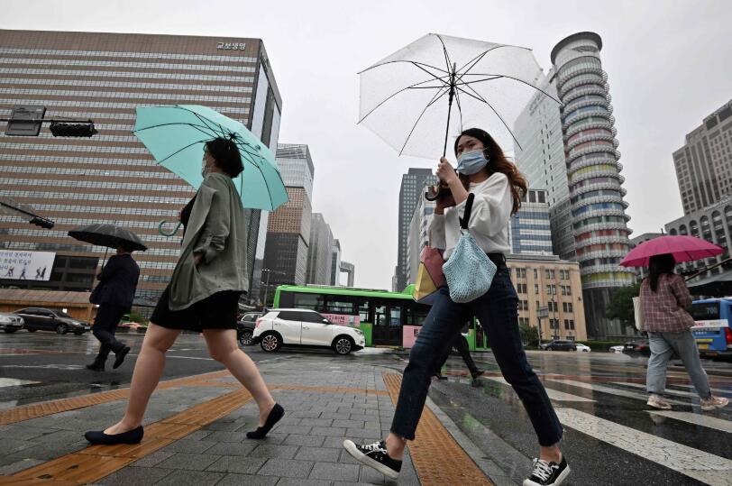 韓國首爾街上市民都戴上口罩 (法新社資料圖片)