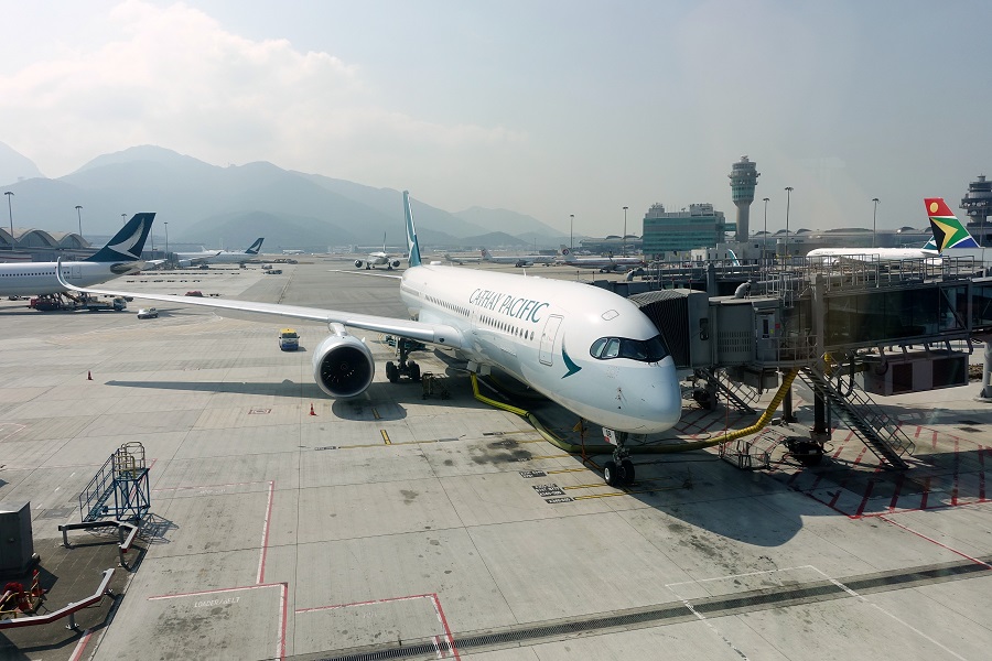 據知情人士透露A香港機場將很快恢復到內地的中轉航班服務]中新社^