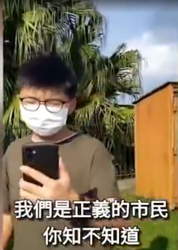 黃之鋒被香港市民罵u漢奸v]視頻截圖^